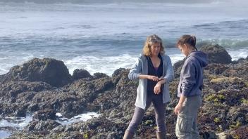 UC Davis professor Ellie Fairbairn and a UC Davis Pre-College student explore the tidal pools at Bodega Bay Reserve