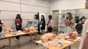 UC Davis Pre-College Program students learn the basics of CPR training