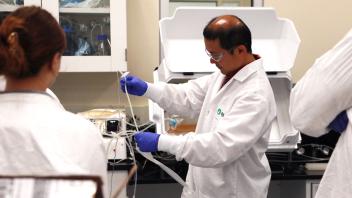 Students in the UC Davis Cell and Gene Therapy Manufacturing Bootcamp in the lab