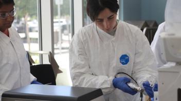 Cell and Gene therapy students working in lab