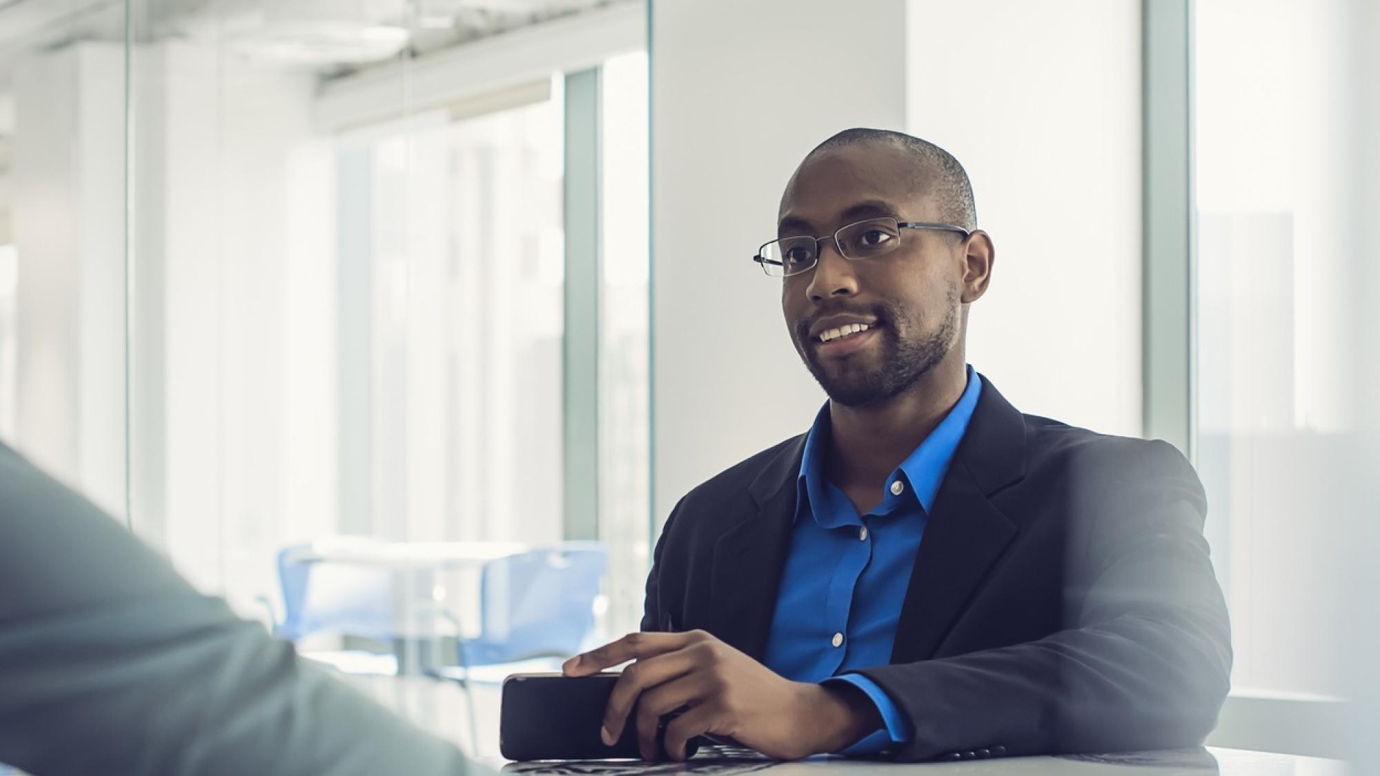 Coaching talking with a client