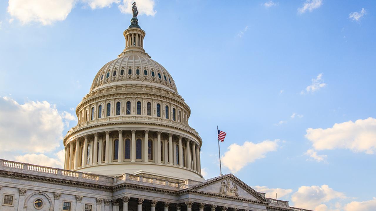 Close up image of the United States White house with American flag flying