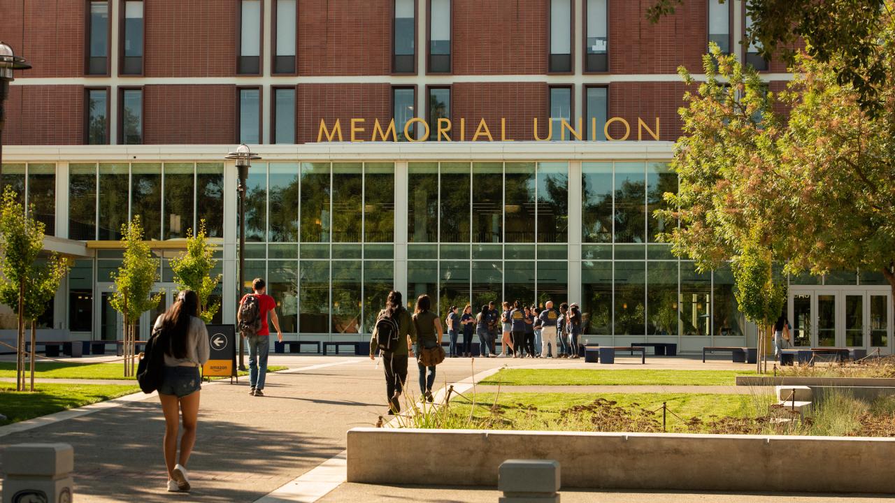 students walking up to UC Davis Student Union