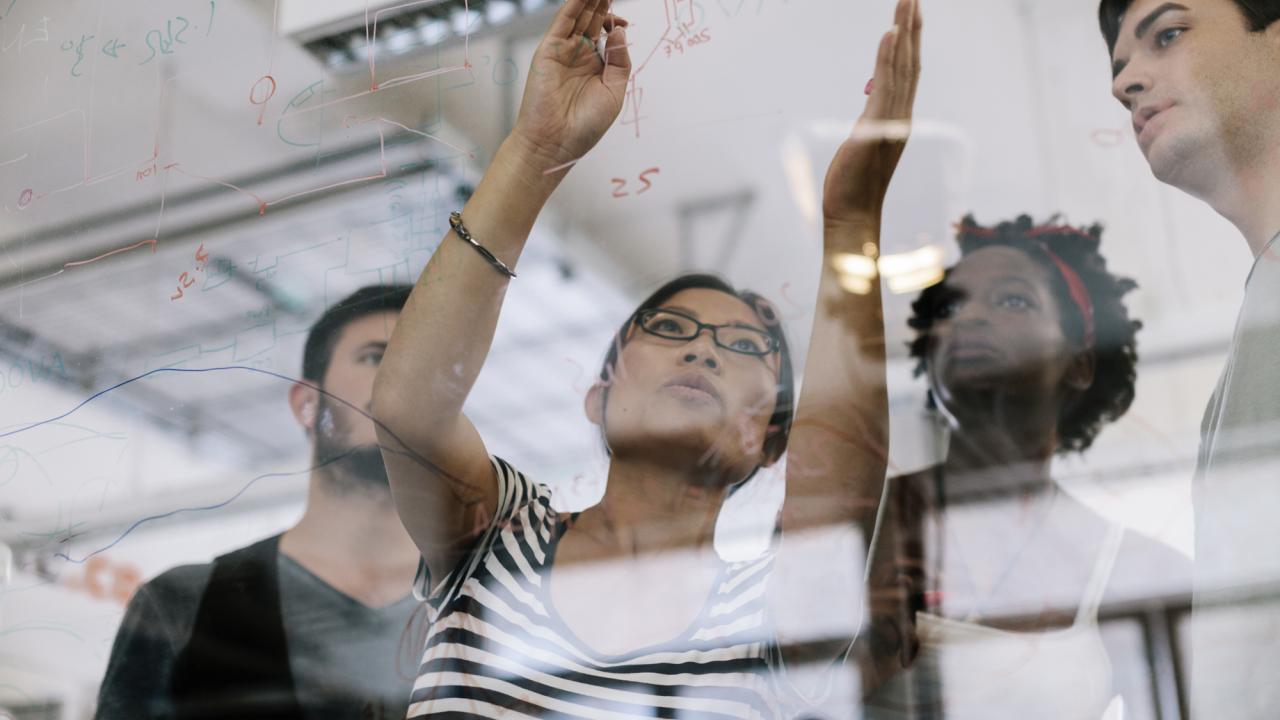 woman leading a discussion in the office