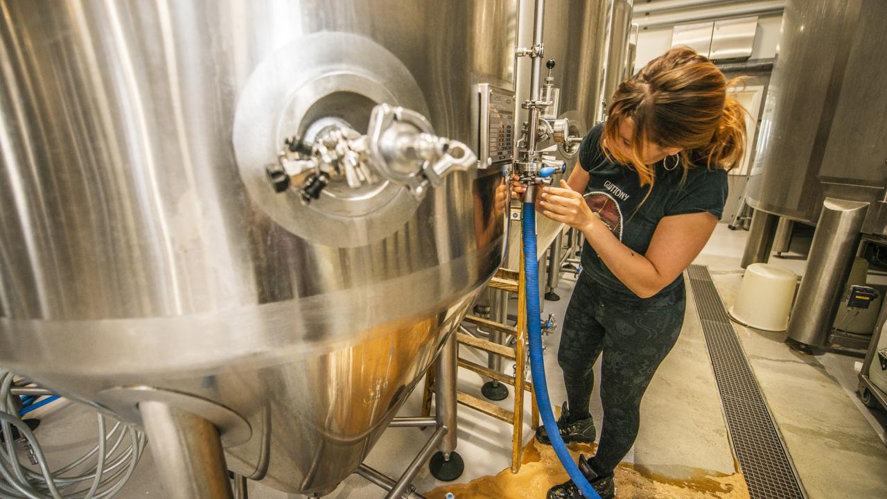 brewer Mariana Schneider working in the brewery