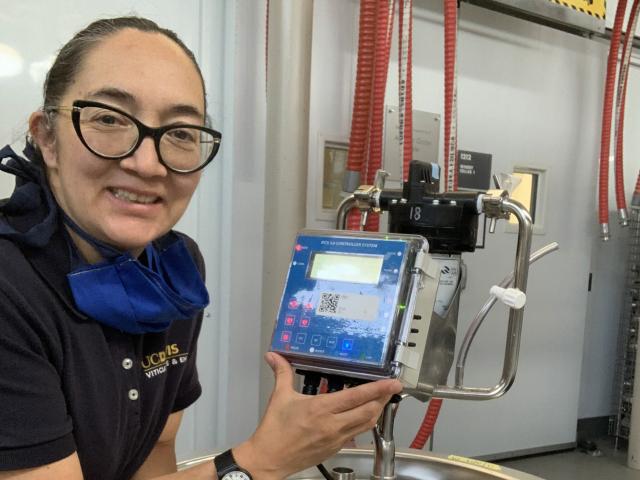 UC Davis Winemaking instructor Chacon-Rodriguez in winery