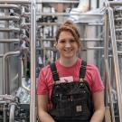 Tapping Potential Scholarship winner Jae Vanderwerf poses in brewery
