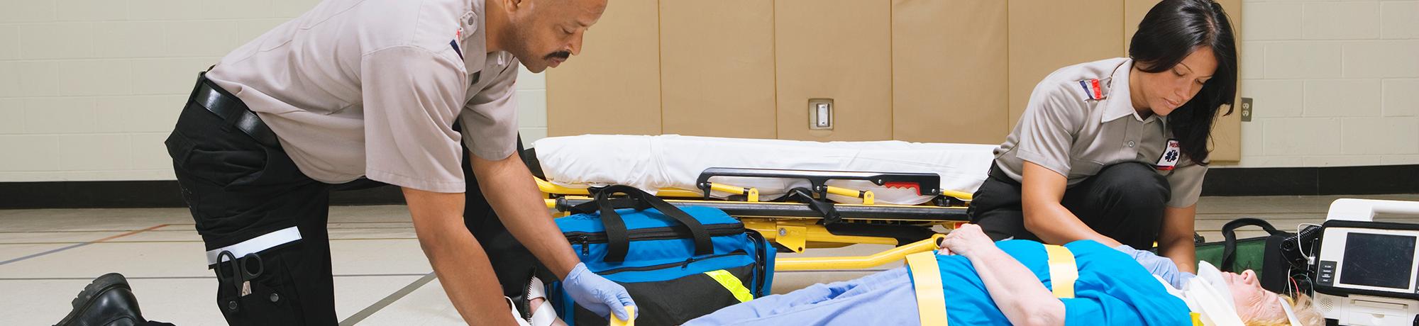 EMTs tending to a patient on the floor